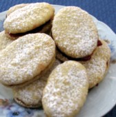 Lemony Butter Cookies filled with Raspberry Jam